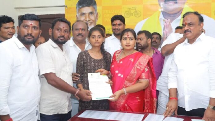 Home Minister Vangalapudi Anita Hands Over Insurance Cheques to Deceased Party Workers' Families