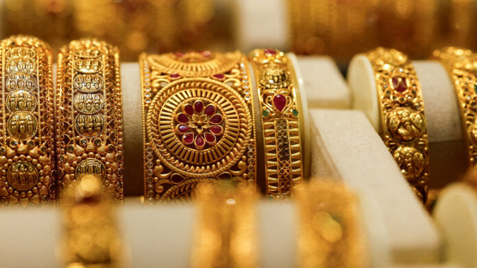 Gold Hits Two-Week High as Weak Dollar, Fed Uncertainty Boost Safe-Haven Demand